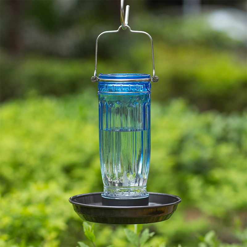 Glass bird hotsell water feeder